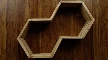 Unfinished hexagon shelf out of popsicle sticks