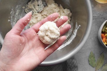 Form Bisquick dumplings into balls